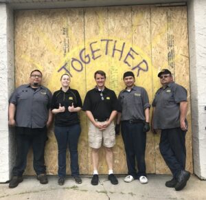 Staff_Together_board_up